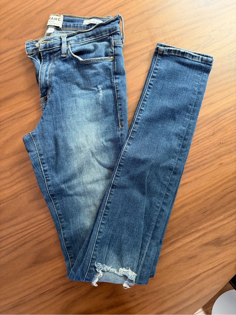 Frame Denim Women's Skinny Jeans in Medium Blue Wash with Frayed Hem